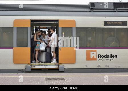 Several people inside a train in Vilanova i la Geltr one of the