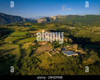 Aerial view of the town of Peramea in a summer sunrise (Pallars Sobirà, Lleida, Catalonia, Spain, Pyrenees) ESP: Vista aérea del pueblo de Peramea Stock Photo