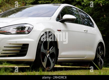 New White Car, Volkswagen Golf GTI MK7 3 door hatchback petrol car Stock Photo