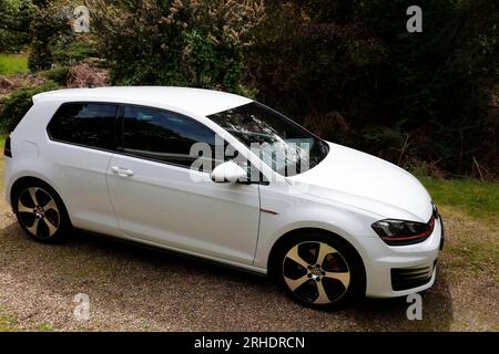 New White Car, Volkswagen Golf GTI MK7 3 door hatchback petrol car Stock Photo