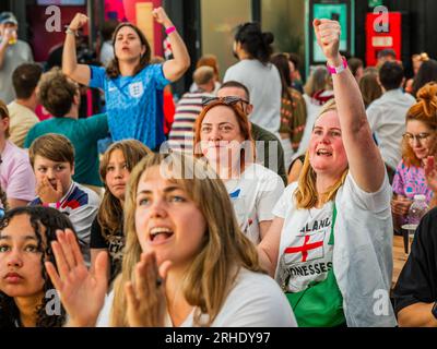 London, UK. 16th Aug, 2023. Fans in the Boxpark Shoreditch to watch the Lionesses in the the England v Australia, FIFA World Cup semi final. Credit: Guy Bell/Alamy Live News Stock Photo