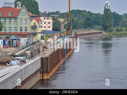 16 August 2023, Brandenburg, Frankfurt (Oder): For about a year, construction work has been underway to improve flood protection along the riverbank promenade on the German-Polish border river Oder. During the 1997 Oder flood, the level reached a new record high of 6.57 meters in Frankfurt (Oder) on July 27. Despite emergency measures, some areas of the city were flooded. The flood protection facilities on the river bank currently protect against an event that statistically occurs once in 100 years. In coordination with the Republic of Poland, flood protection on the Oder is to be designed for Stock Photo