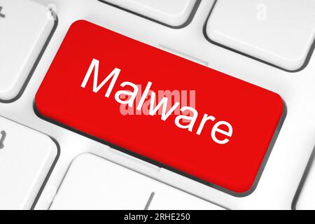 Red button with Malware word on the keyboard close-up, technology concept Stock Photo