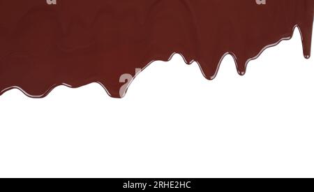 Melted chocolate dripping on white background close-up Stock Photo