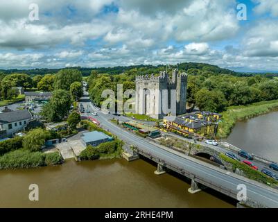 Aerial view of Bunratty Castle  large 15th-century tower house in County Clare in Ireland guarding the crossing on the Ralty river before it reaches t Stock Photo