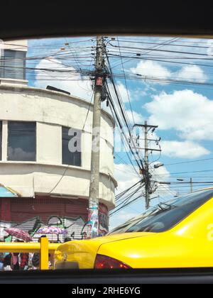 Cityscape of cabling in the city of Quito, Ecuador, seen from a taxi Stock Photo