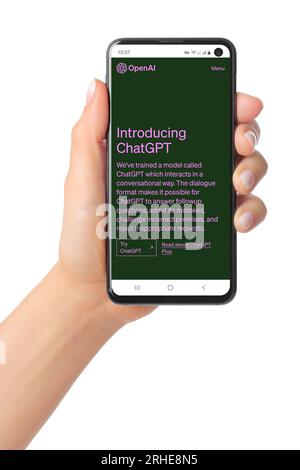 Kiev, Ukraine - March 07, 2023: OpenAI Introducing ChatGPT page on phone screen in hand. OpenAI is non-profit artificial intelligence research organiz Stock Photo