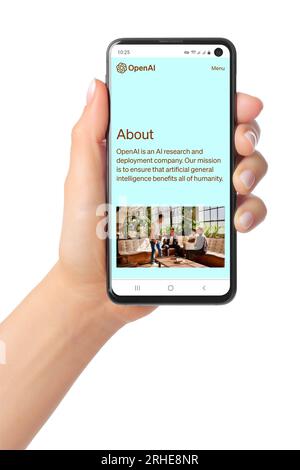 Kiev, Ukraine - March 07, 2023: OpenAI Website Home Page on phone screen in hand. OpenAI is a non-profit artificial intelligence research organization Stock Photo