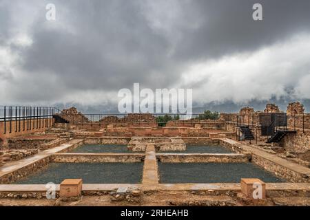 On the top of ruins of the medieval castle of Onda covered with clouds in Spain, Castellon region Stock Photo