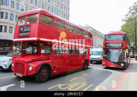 an old style routemaster bus and a new style route master bus on euston road london uk Stock Photo