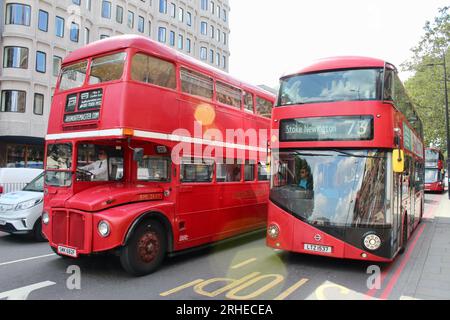 an old style routemaster bus and a new style route master bus on euston road london uk Stock Photo