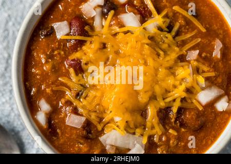 Spicy Hot Chili Con Carne with Cheese and Onions Stock Photo