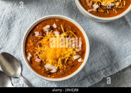 Spicy Hot Chili Con Carne with Cheese and Onions Stock Photo