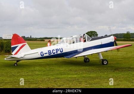 de Havilland Canada DHC1 Chipmunk in classic British Airways airline colour scheme at Little Gransden airfield, UK. DHC-1 Chipmunk 22, formerly RAF Stock Photo