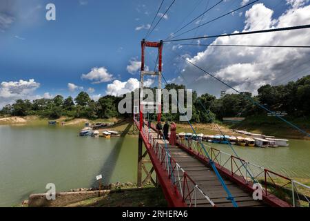 Rangamati, Bangladesh - July 25, 2023: A Hanging Bridge on Kaptai Lake in Rangamati. Kaptai Lake is a people made lake in south-eastern Bangladesh. It Stock Photo