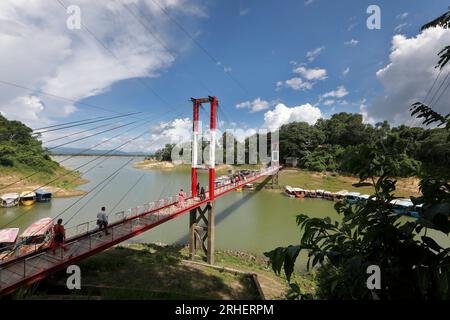 Rangamati, Bangladesh - July 25, 2023: A Hanging Bridge on Kaptai Lake in Rangamati. Kaptai Lake is a people made lake in south-eastern Bangladesh. It Stock Photo