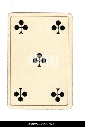 An antique five of clubs playing card on a white background. Stock Photo