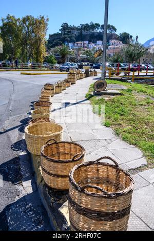 Traditional woven wicker baskests for sale on the street at the market in the old quarter of Kalamata, Messinina, Poloponnese, Greece. Stock Photo