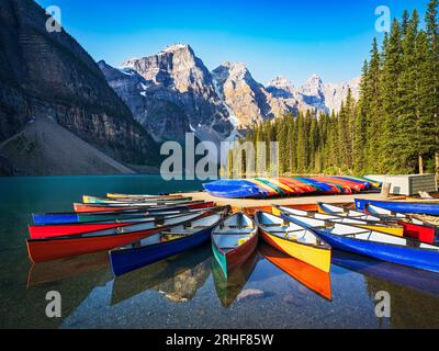 Calm Morning at Moraine Lake during summer in  Banff National Park, Canadian Rockies, Alberta, Canada.  Banff National Park, Alberta, Canada Stock Photo