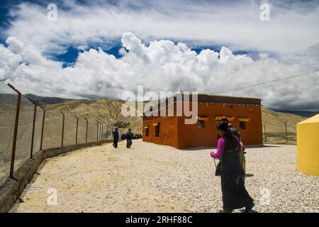 Namgyal Monastery in Lo Manthang of Upper Mustang in Nepal with Lama Buddhists and Pilgrims Stock Photo