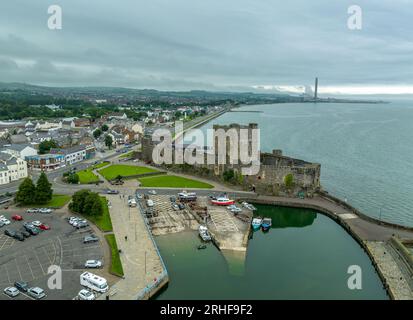 Aerial view of Carrickfergus Castle Anglo Norman castle in Northern Ireland, in County Antrim, on the northern shore of Belfast Lough with large recta Stock Photo