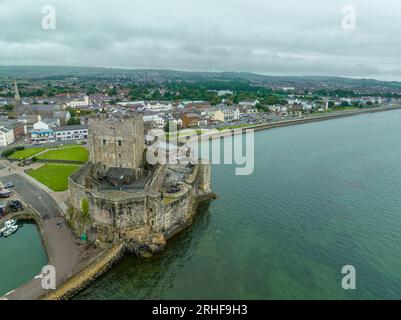 Aerial view of Carrickfergus Castle Anglo Norman castle in Northern Ireland, in County Antrim, on the northern shore of Belfast Lough with large recta Stock Photo