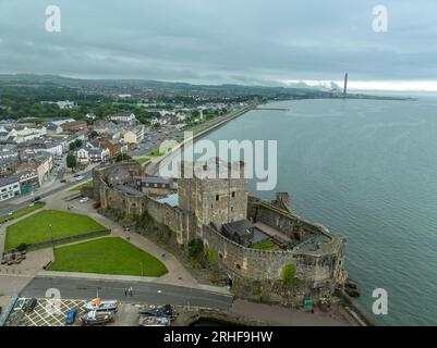 Aerial view of Carrickfergus Castle Anglo Norman castle in Northern Ireland, in County Antrim, on the northern shore of Belfast Lough with large recta Stock Photo