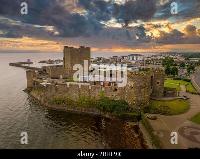 Aerial view of Carrickfergus Castle Anglo Norman castle in Northern Ireland, in County Antrim, on the northern shore of Belfast Lough with large recta Stock Photo