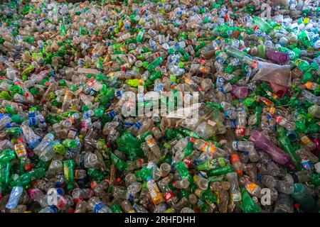 Different types of plastic bottles gathered for recycling in Dhaka, Bangladesh. Stock Photo