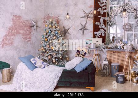 New Year's photo zone with snow near a cafe bakery.Christmas decor: toys Stock Photo