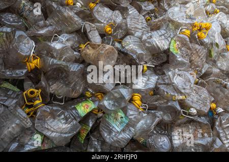 Different types of plastic bottles gathered for recycling in Dhaka, Bangladesh. Stock Photo