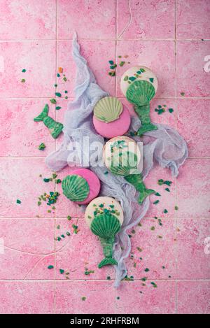 Macaroon with chocolate shell and mermaid tail Stock Photo - Alamy