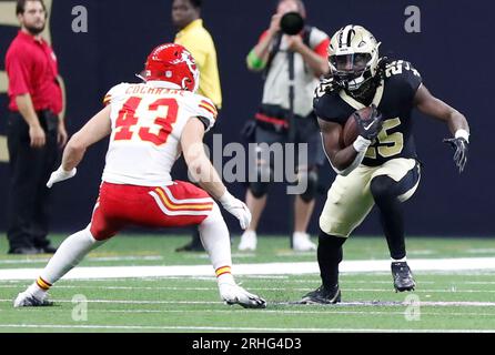 New Orleans, USA. 13th Aug, 2023. New Orleans Saints running back Kendre Miller (25) tries to get past Kansas City Chiefs linebacker Jack Cochrane (43) during a National Football League preseason game at the Caesars Superdome in New Orleans, Louisiana on Sunday, August 13, 2023. (Photo by Peter G. Forest/Sipa USA) Credit: Sipa USA/Alamy Live News Stock Photo