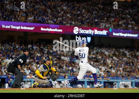 Los Angeles Dodgers second basemen Mookie Betts (50) swings the bat during a regular season game between the Milwaukee Brewers and Los Angeles Dodgers Stock Photo