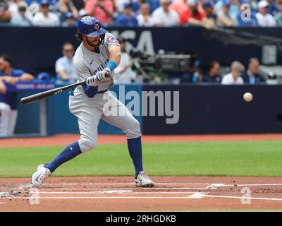 Chicago Cubs shortstop Dansby Swanson (7) hits a double in the top of the first inning to score second baseman Nico Hoerner (2), and left fielder Ian Happ (8) to give the Cubs and early 2-0 lead during a baseball game against the Toronto Blue Jays on Sunday, Aug. 13, 2023, at the Rogers Center in Toronto, Cananda. (Photo by Nicholas T. LoVerde/Cal Sport Media) (Credit Image: © Nicholas T. Loverde/Cal Sport Media) Stock Photo