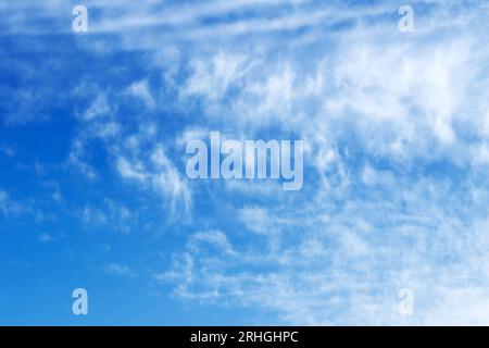Blue sky and white clouds background. Beautiful clear cloudy in sunlight calm season. Stock Photo