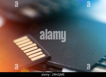 Micro sd card lies on a pile of memory cards. close-up. Stock Photo
