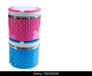 Pink and blue color lunch boxes isolated on a white background with copy space. Stock Photo