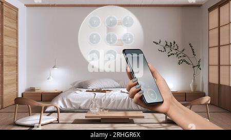Smart home technology interface on phone app, augmented reality, internet of things, interior design of japandi minimalist bedroom, woman hand holding Stock Photo