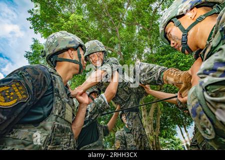 NANNING, CHINA - AUGUST 17, 2023 - SWAT team members finish a game during a training break in Nanning, Guangxi province, China, August 17, 2023. Stock Photo