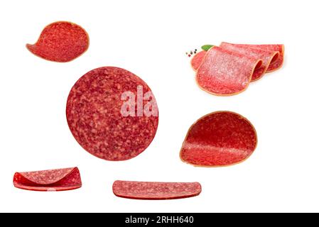 Falling tasty salami isolated on white background. Stock Photo