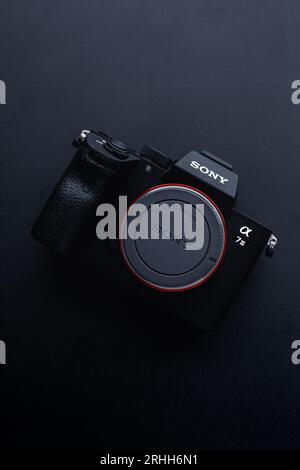 A photo of a Sony Alpha A7III mirrorless camera body. Stock Photo