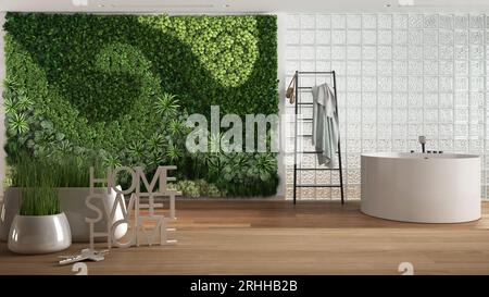 Wooden table, desk or shelf with potted grass plant, house keys and 3D letters home sweet home, over bathroom with vertical garden, architecture inter Stock Photo