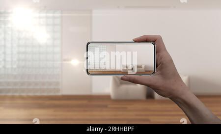 Hand holding smart phone, AR application, simulate furniture and interior design products in real home, architect designer concept, blur background, m Stock Photo