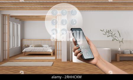 Smart home technology interface on phone app, augmented reality, internet of things, bedroom and bathroom design with connected objects, woman hand ho Stock Photo