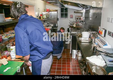 Busy opening night in the Framlingham Crown Hotel of the new stables to restaurant conversion at the back and inevitably a bit fraught for the staff Stock Photo