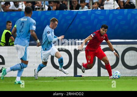 Piraeus, Greece. 16 August, 2023: Marcos Acuna of Sevilla competes against Cole Palmer of Manchester City during the UEFA Super Cup 2023 match between Manchester City FC and Sevilla FC at Georgios Karaiskakis Stadium in Piraeus, Greece. August 16, 2023. (Photo by Nikola Krstic/Alamy) Stock Photo