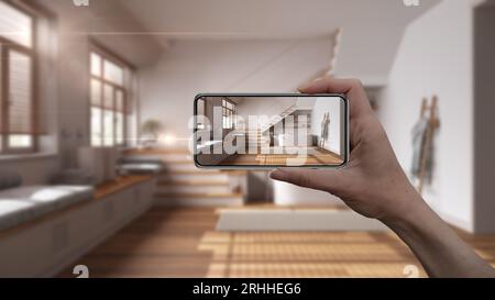 Hand holding smart phone, AR application, simulate furniture and interior design products in real home, architect designer concept, blur background, j Stock Photo