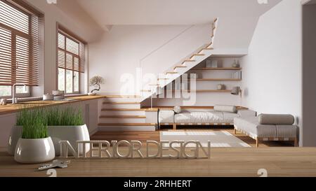 Wooden table, desk or shelf with potted grass plant, house keys and 3D letters making the words interior design, over kitchen and living room, project Stock Photo