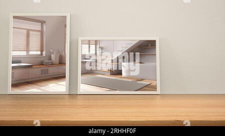 Minimalist mirrors on wooden table, desk or shelf reflecting interior design scene. Modern japandi bathroom with bathtub and staircase. Contemporary b Stock Photo